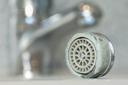 How Do I Remove Calcium Buildup On My Faucet? - NuvoH2O